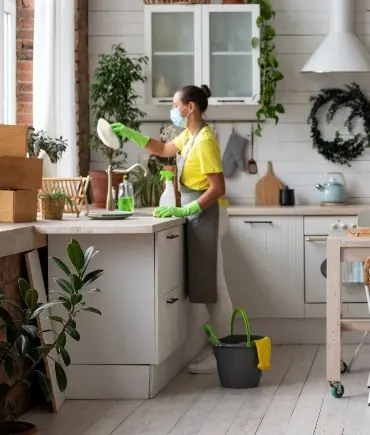 House cleaner at work in a kitchen in Lagos